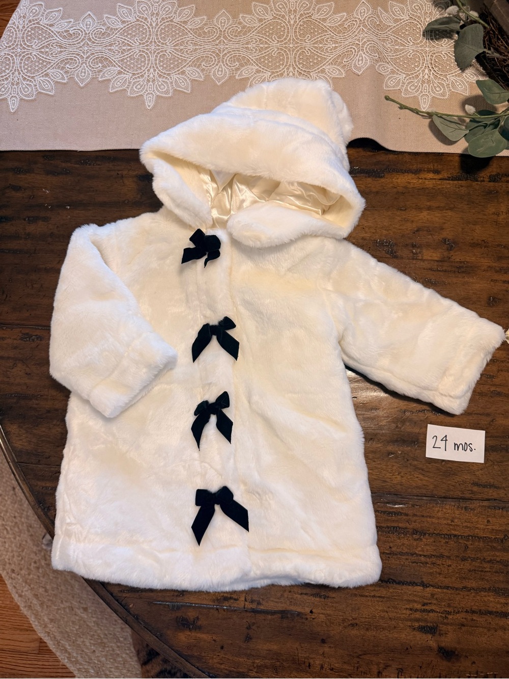 Cream Faux Fur Hooded Baby Coat with Black Bows